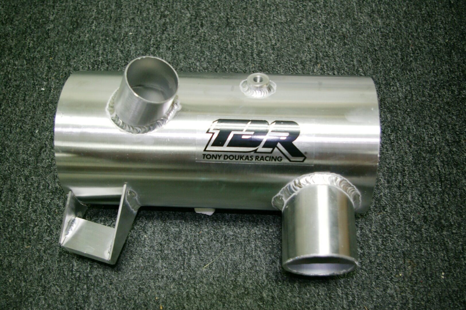 A SeaDoo Spark waterbox 2015-2023 Part# 02-0108 with the word TDR on it.