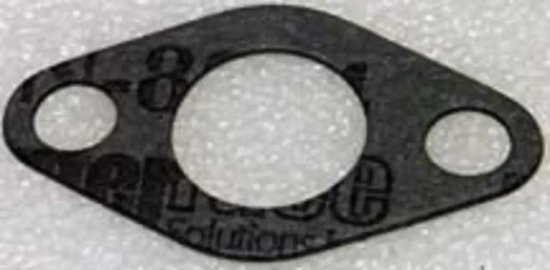 A black OEM Banshee Cylinder Head Water Inlet Gasket, Part#3XV-12435-00-00, on a white surface.