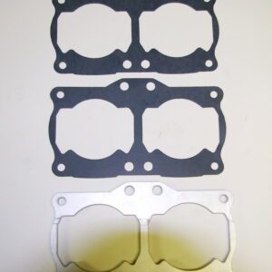 A set of gaskets and 4mm Stroker Spacer Kit, Part# 15-4765 on a table.