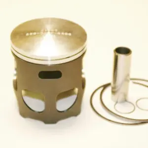 A WSM piston with a ring and a Forged Lightweight Piston Kit, Part# 16-5788 piston ring.