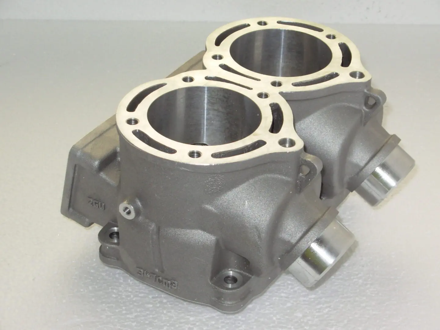 A pair of Cheetah Cub Cylinder 443cc 68mm Bore carburetors for a 443cc engine on a white surface.