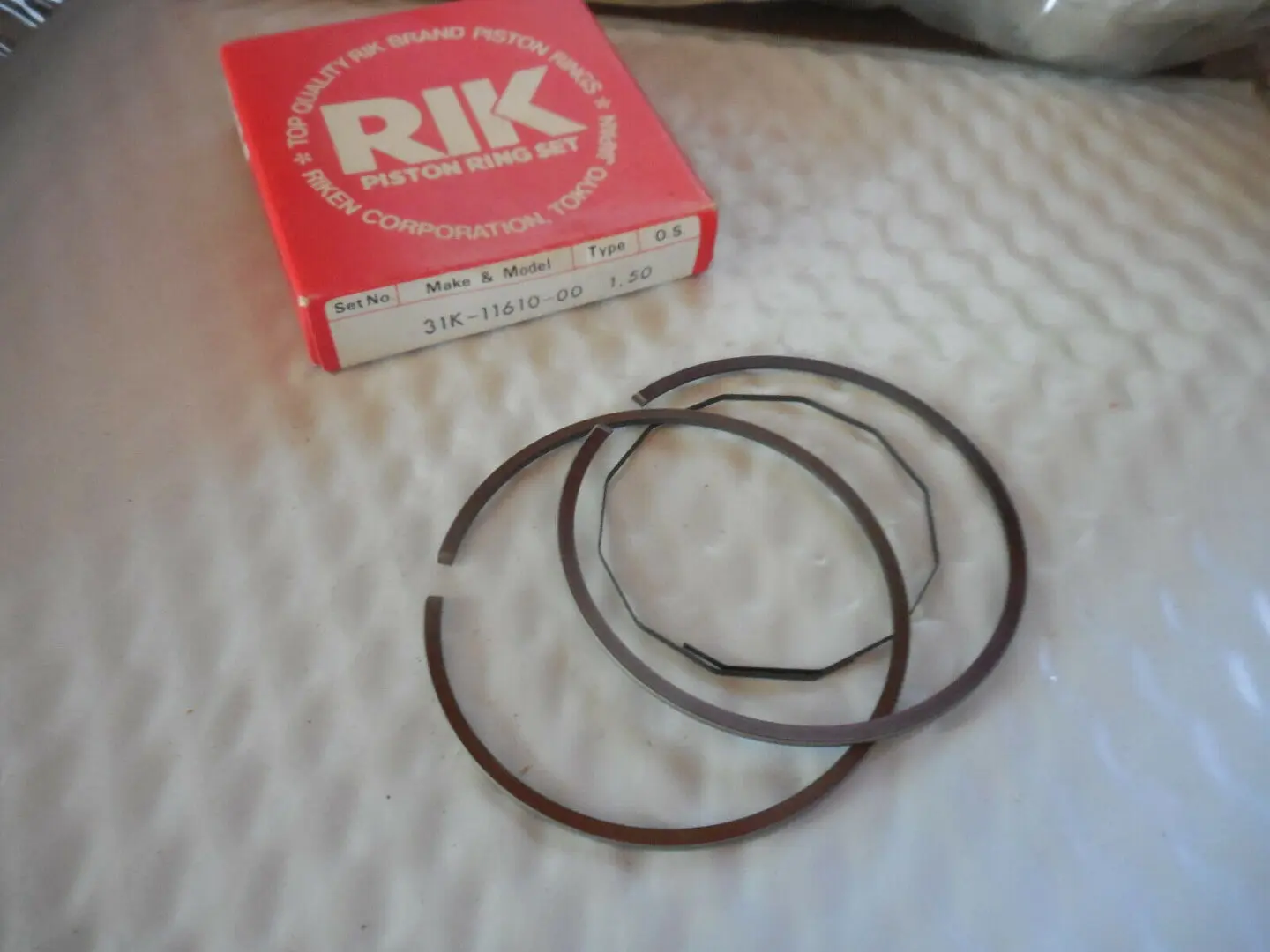 A set of WSM piston rings for cast pistons, Part# 16-5815C.