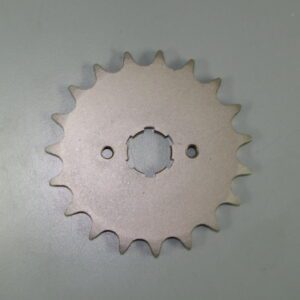 A Banshee/RZ 350 front Counter Shaft Sprocket on a white surface, part# 18-5003.