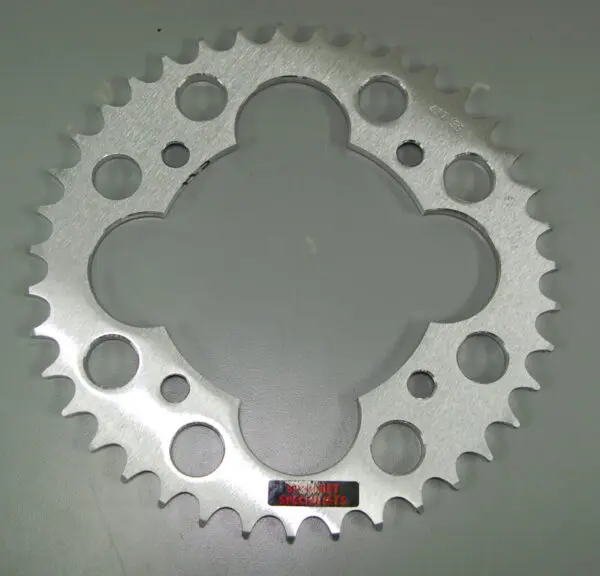 A Aluminum Rear Sprocket for Honda TRX placed on a white surface.