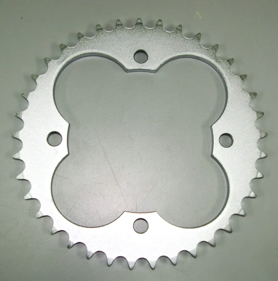 A Steel Rear Sprocket 4 bolt with a Honda TRX pattern, Part# 18-5005, placed on a white surface.