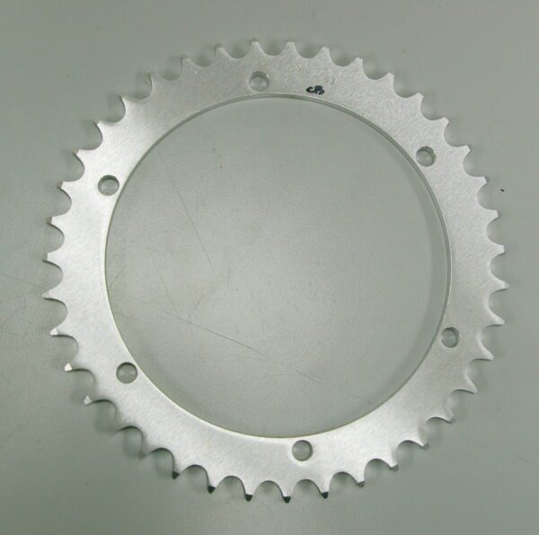 This image shows a shiny Aluminum Rear Sprocket for Banshee, Part# 18-5024 on a white surface.