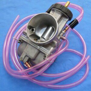 A 35mm Keihin "PWK" Air Striker Carburetor Kit, Part 22-5748 with a pink hose attached to it.