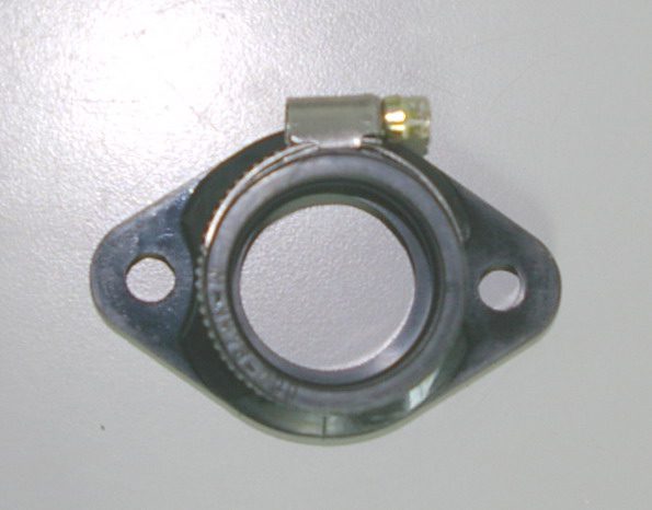 A metal plate with a hole, suitable for Mikuni Intake Flange (Part# 22-5805).