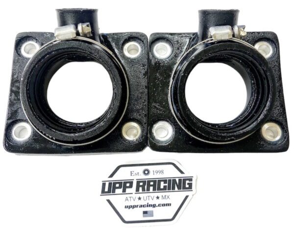 A pair of black UPP Intake Manifolds 30 to 35mm With Boost holes mounts with the UPP Racing logo. Part# 22-5806