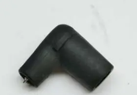 A PVL non-resistor spark plug cap, Part# 23-5822 sits on a white surface.