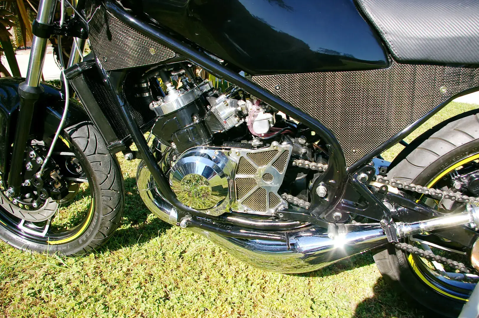 A close up of the engine on a motorcycle.
