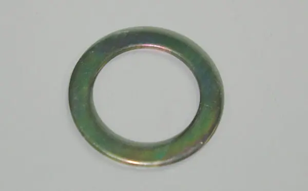 A photo of a small metal washer.