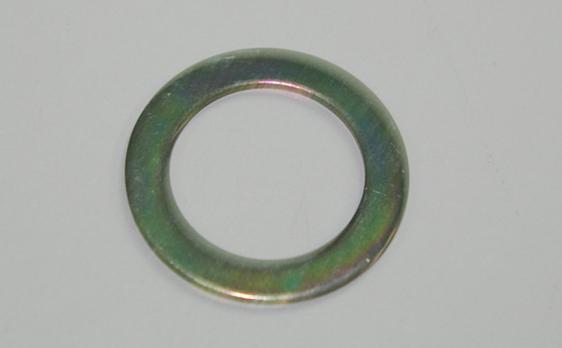 A photo of a small metal washer.