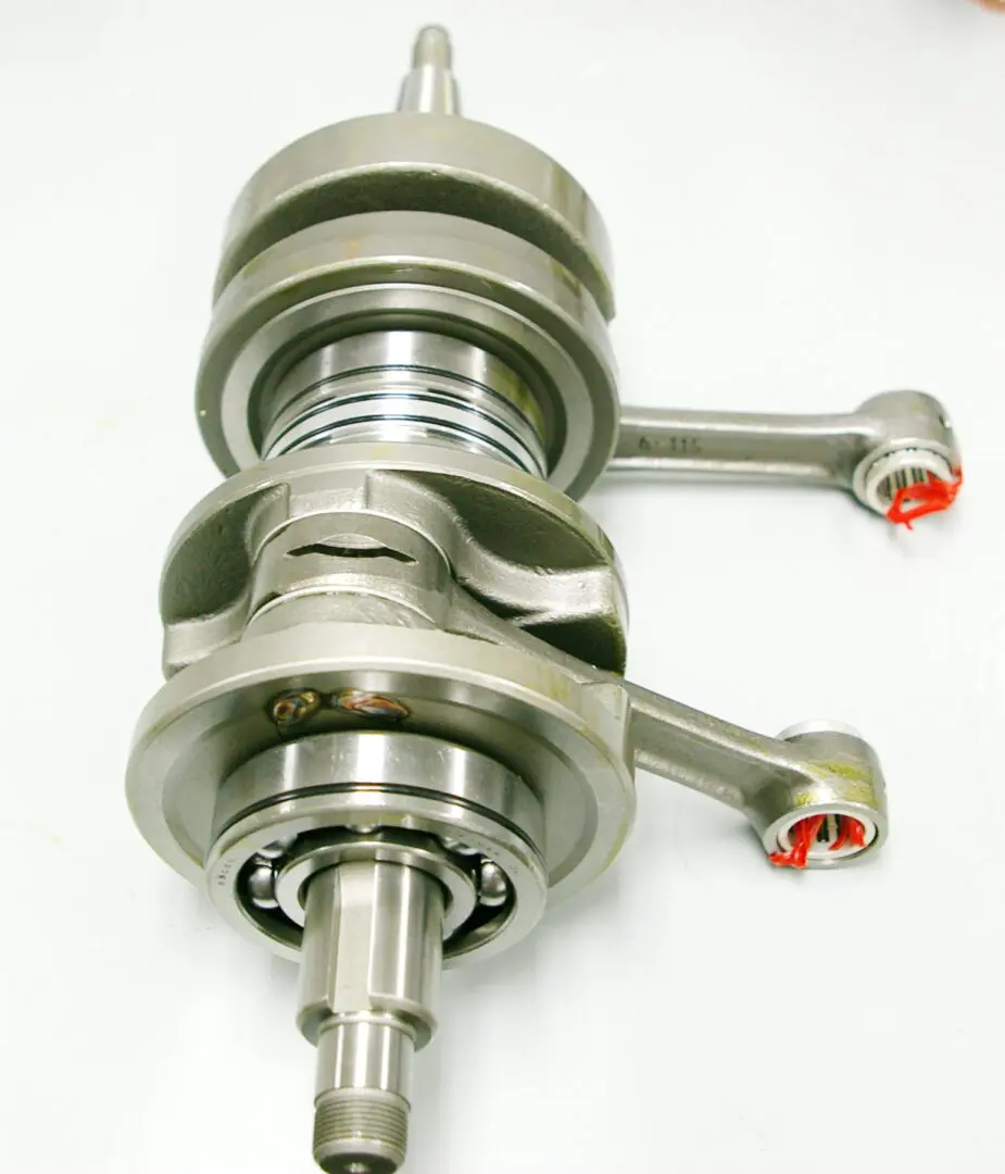 This WSM 7mm Stroker Crankshaft for Banshee, Part# 91-5718 is displayed on a white surface.