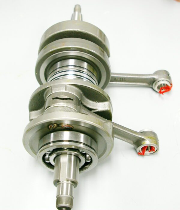 A WSM 4mm Stroker Crankshaft for Banshee, Part# 91-5721, is displayed on a white surface.