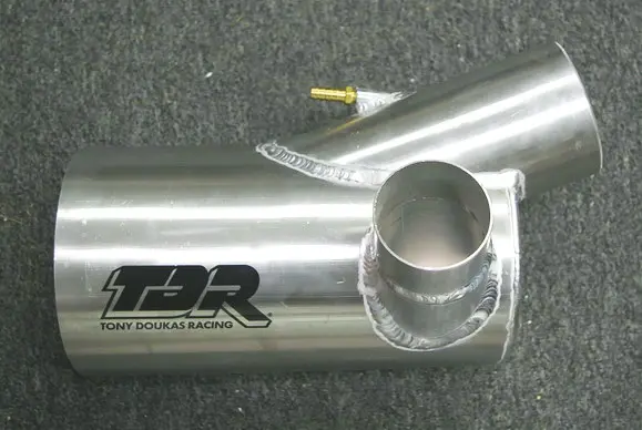 A close up of the exhaust pipe on a motorcycle