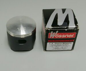 A piston with a Big Bore Forged Blaster Piston Kit, Part# W240 box next to it.