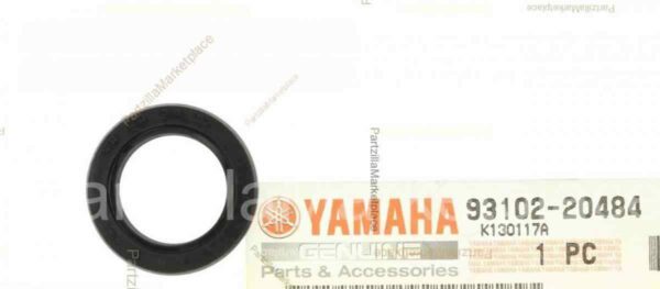 An OEM Yamaha RZ 350 Banshee Kick Start Seal, Part 93102-20484-00 New. 93101-20048, with a label on it.