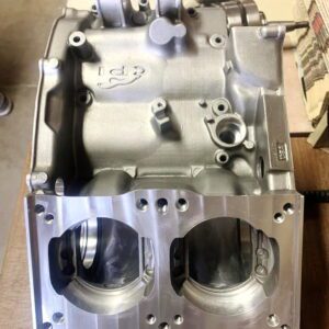 A "CP Industries Sandcast Crankcase for Yamaha RZ 350/Banshee, Part 91-5736" is sitting on top of a table.